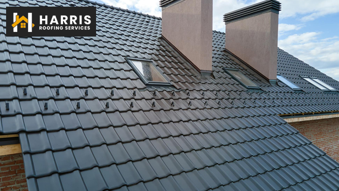 Close-up of ice and rain shield underlayment being installed on a roof.